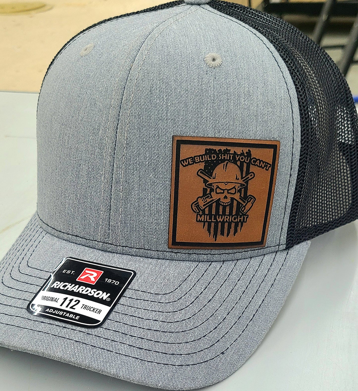 Millwright leather patch trucker hat