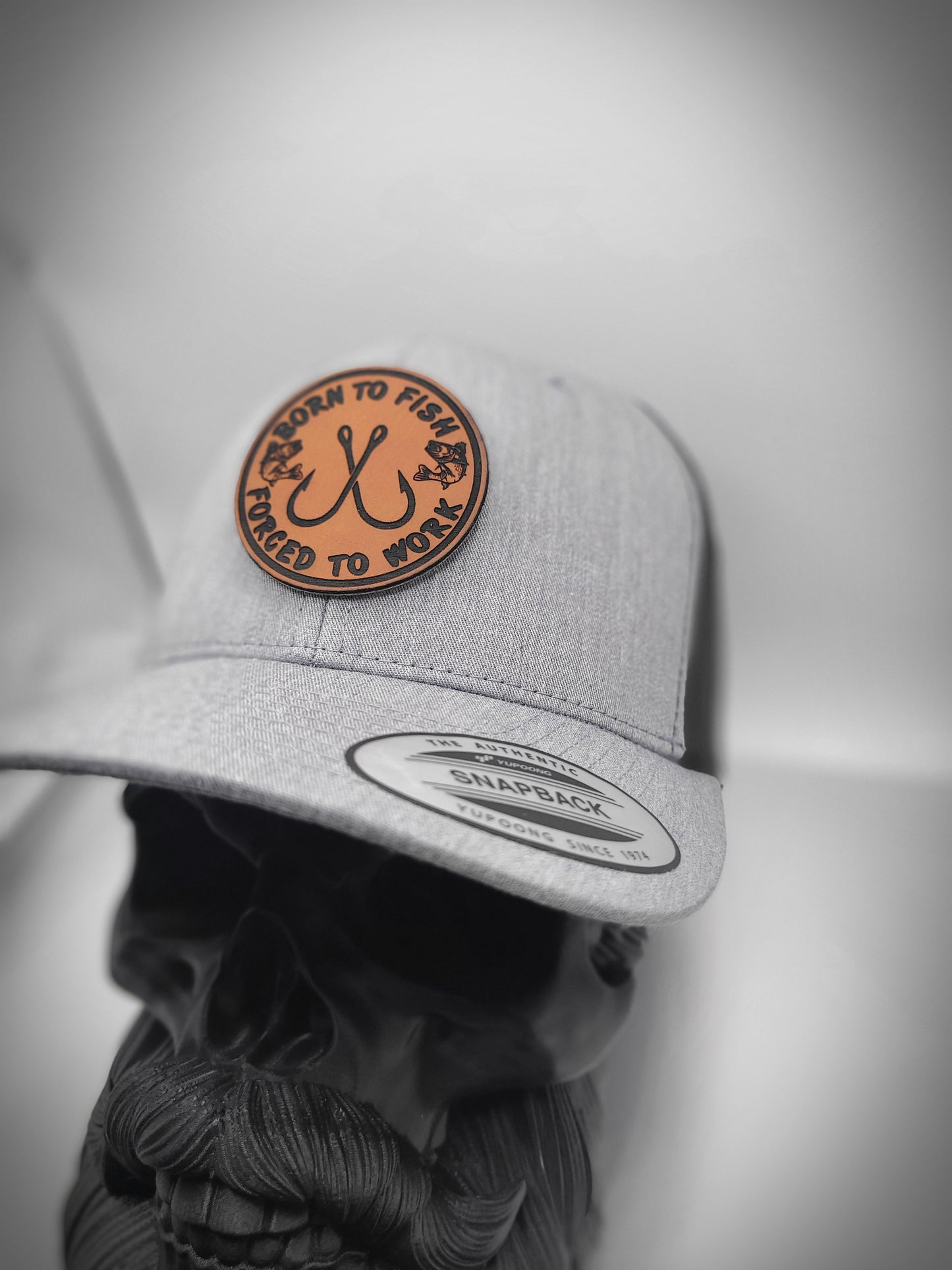 Yupoong Classic Patch Trucker hat, born to fish forced to work.