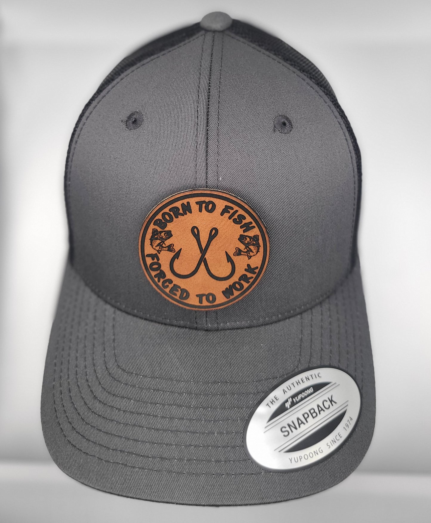 Yupoong Classic Patch Trucker hat, born to fish forced to work.