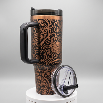 Laser engraved mandala pattern 40oz tumbler with bold lettering - studio angle shot