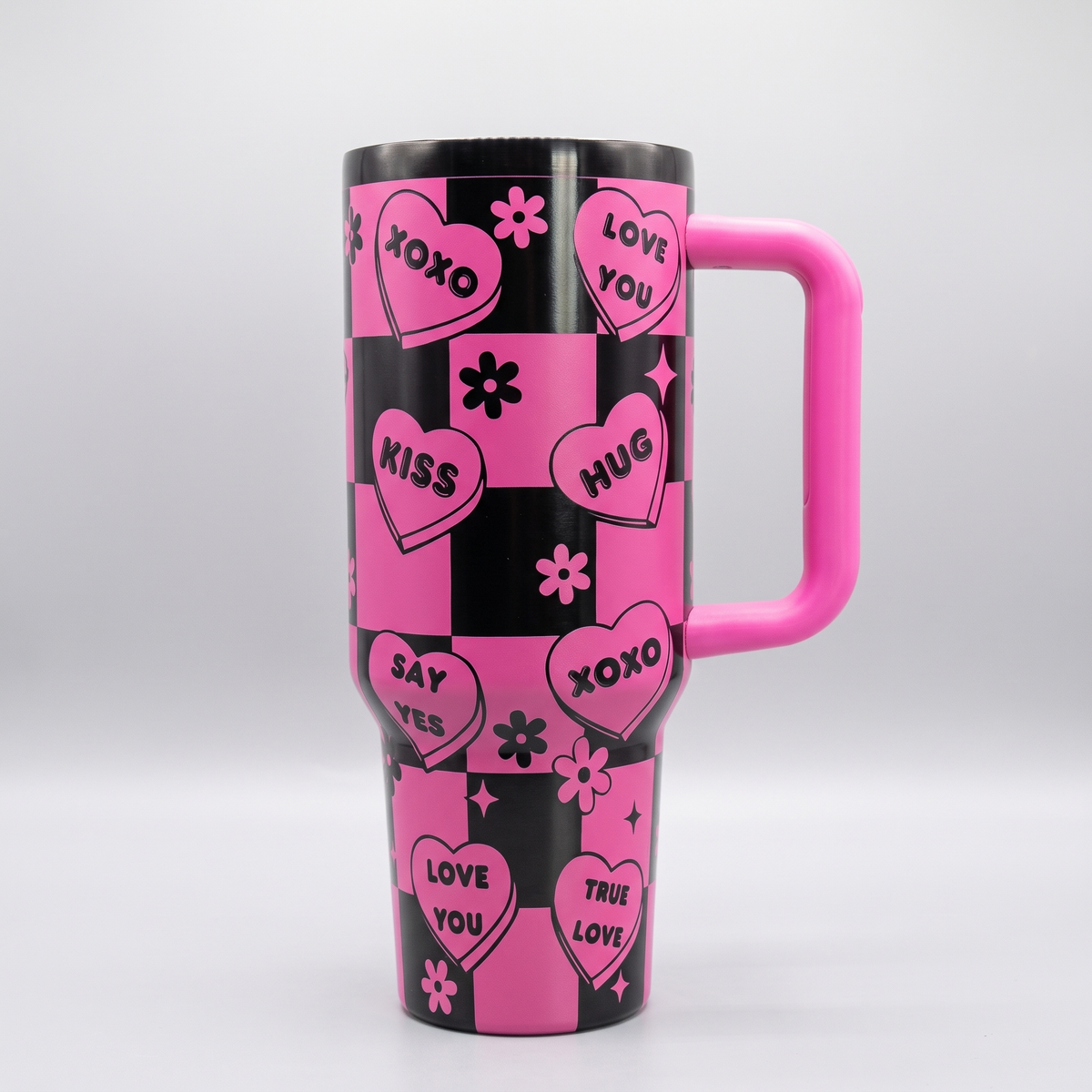 40oz Love Notes tumbler - pink and black checkered candy heart laser engraving, studio hero shot