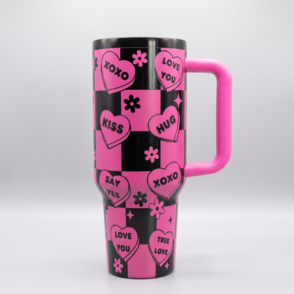 40oz Love Notes tumbler - pink and black checkered candy heart laser engraving, studio hero shot