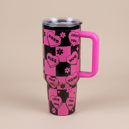 40oz Love Notes tumbler - pink and black checkered candy heart laser engraving, studio angle shot
