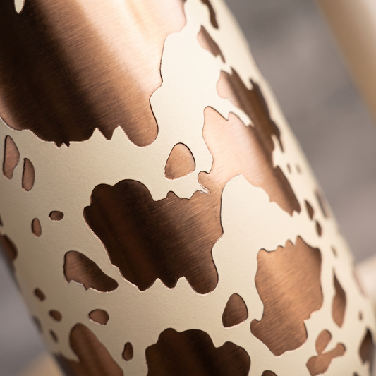 40oz Cow Print tumbler - close-up of laser engraved cow print texture