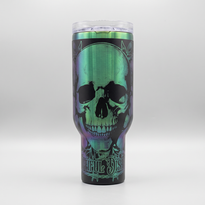 40oz Beautiful Disaster tumbler - laser engraved holographic skull design, studio hero shot