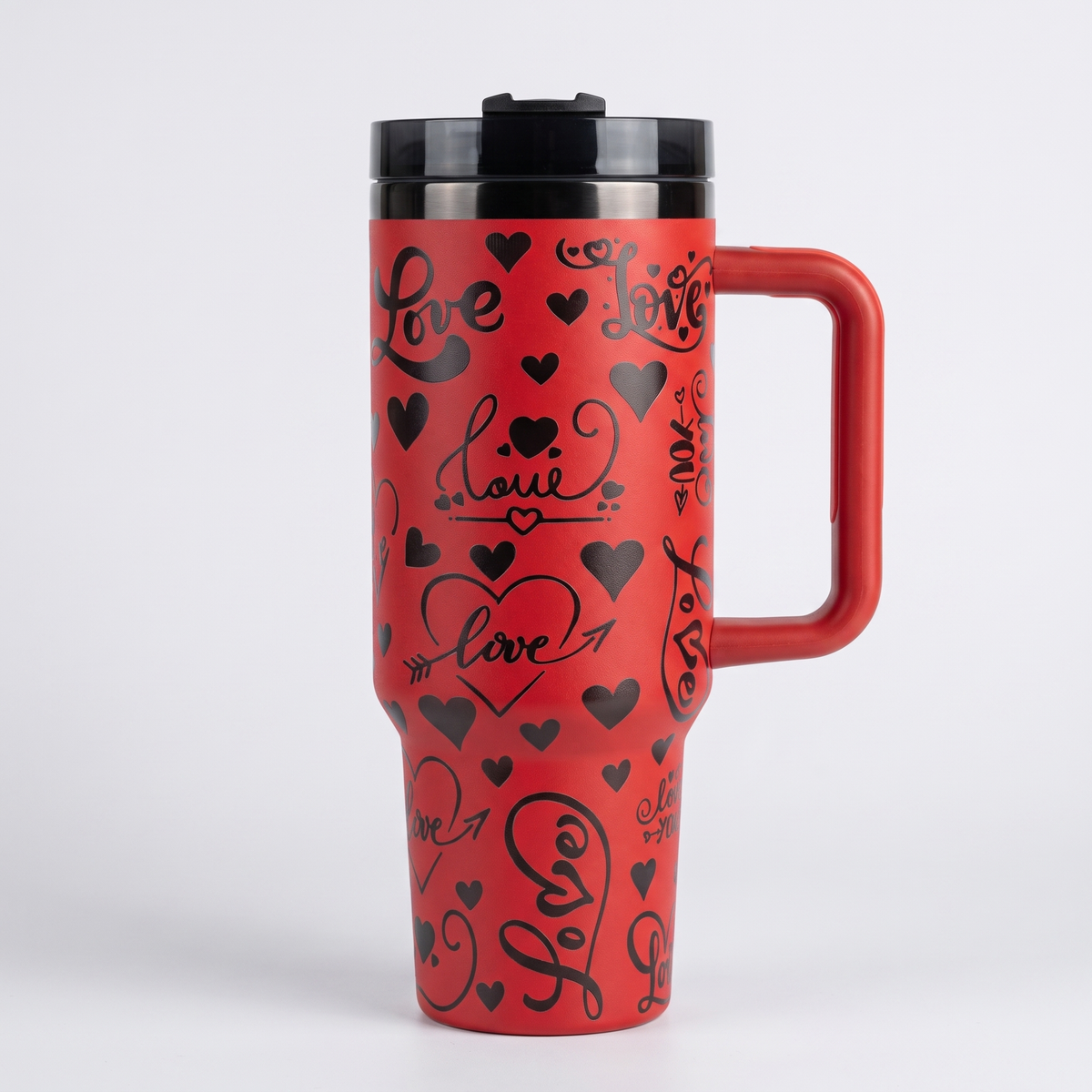 40oz Valentines Love tumbler - laser engraved heart and Love script pattern on red tumbler, studio hero shot