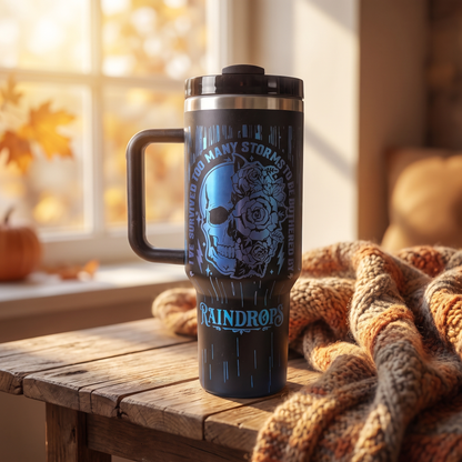 40oz Survived Storms tumbler - I've Survived Too Many Storms To Be Bothered By Raindrops, studio lifestyle shot